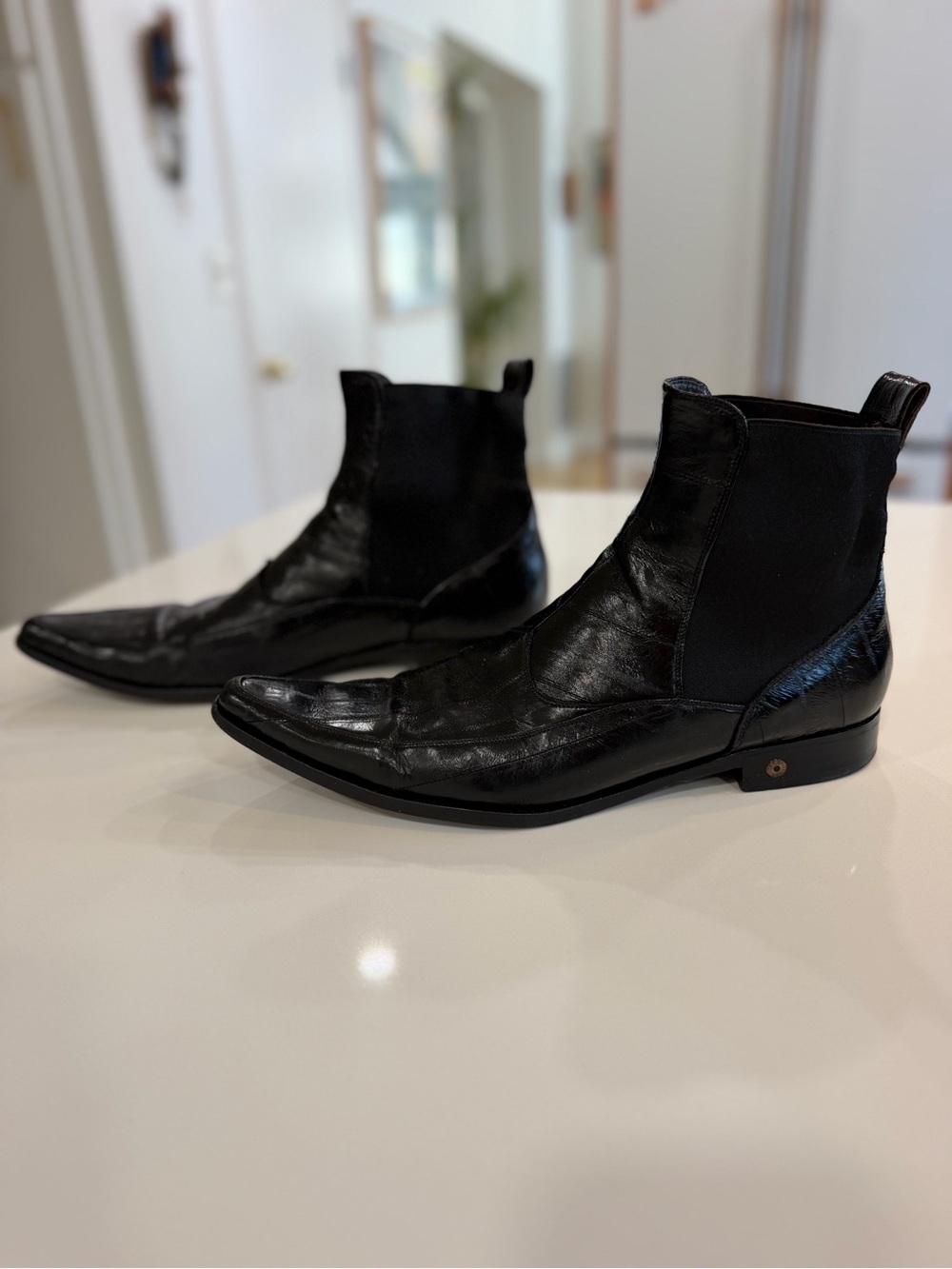 Dolce & Gabbana Black Pointed Eel skin Chelsea boots.